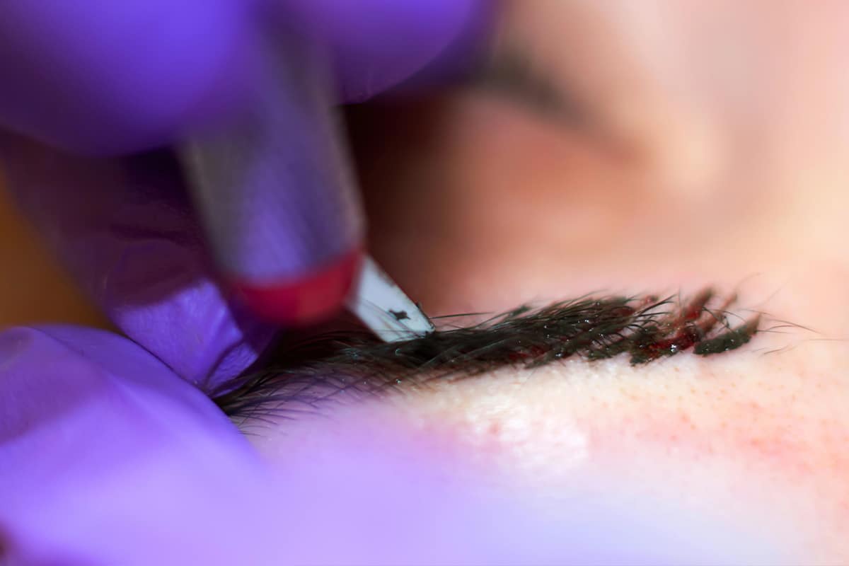 Gender neutral eyebrow tint beauty treatment close up