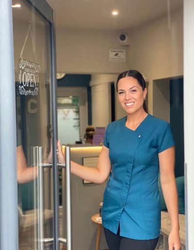 Welcome to chakra - staff member opening the door